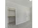Bedroom with closet and white carpet, showcasing the storage and layout at 1724 Deacon Falls Way, Wendell, NC 27591