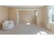 Bonus room featuring neutral walls, carpeting and natural light, perfect for relaxation at 1724 Deacon Falls Way, Wendell, NC 27591