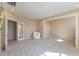 Spacious bonus room with neutral walls, carpeting and French doors, perfect for entertaining at 1724 Deacon Falls Way, Wendell, NC 27591