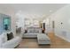 Spacious living room with seamless flow to the kitchen and dining area at 1724 Deacon Falls Way, Wendell, NC 27591