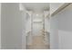 Large walk-in closet with custom shelving and ample storage space at 1724 Deacon Falls Way, Wendell, NC 27591