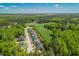 Aerial view of the neighborhood, highlighting the home's location amidst trees and providing a sense of community at 2008 Stanwood Dr, Apex, NC 27502