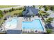 Aerial view of community pools, clubhouse, and amenities showcasing an active lifestyle and social gatherings at 2008 Stanwood Dr, Apex, NC 27502