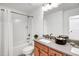 Clean bathroom features shower, tub, and vanity with modern hardware, providing a comfortable and functional space at 2008 Stanwood Dr, Apex, NC 27502