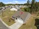 Home aerial showcases manicured lawn, convenient driveway, and residential surroundings at 2040 Alderman Way, Creedmoor, NC 27522