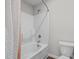 Neat bathroom featuring a shower, toilet, and neutral colored walls at 2040 Alderman Way, Creedmoor, NC 27522
