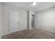 Spacious bedroom with carpet, and multiple access doors at 2040 Alderman Way, Creedmoor, NC 27522