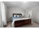 Inviting bedroom with a comfortable bed, stylish bedding, and bright natural light at 2040 Alderman Way, Creedmoor, NC 27522