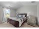 Bright main bedroom with a large window, natural light, and comfortable seating at 2040 Alderman Way, Creedmoor, NC 27522