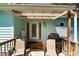 Inviting back deck with comfortable seating and grill, perfect for outdoor dining and relaxation at 209 Pen Lou Ct, Angier, NC 27501