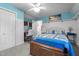 Cozy bedroom featuring a queen bed, built-in shelves, and a bright decor at 209 Pen Lou Ct, Angier, NC 27501
