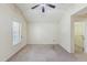 Neutral bedroom featuring vaulted ceiling, carpeted floors, and a single window for natural light at 2211 Hillock Dr, Raleigh, NC 27612