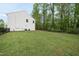 Expansive fenced-in backyard with lush green grass, perfect for recreation at 226 Fair Oaks Ct, Mebane, NC 27302