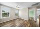 Bright bedroom with light walls, wood floors, and a ceiling fan at 226 Fair Oaks Ct, Mebane, NC 27302
