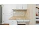 Desk area featuring granite countertops, white cabinetry, and hardwood flooring at 226 Fair Oaks Ct, Mebane, NC 27302