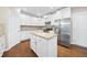 Kitchen featuring granite countertops, white cabinets, and stainless steel appliances at 226 Fair Oaks Ct, Mebane, NC 27302