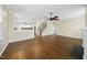 Living room view with open concept to kitchen and stairway at 226 Fair Oaks Ct, Mebane, NC 27302
