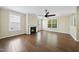 Living room with fireplace, hardwood floors, and bright, natural light at 226 Fair Oaks Ct, Mebane, NC 27302