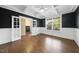 Office with hardwood floors, coffered ceiling and french doors leading to another room at 226 Fair Oaks Ct, Mebane, NC 27302