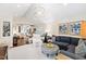 Open-concept area with a living room, kitchen, and dining area, perfect for modern living and entertaining at 2415 Van Dyke Ave, Raleigh, NC 27607