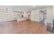Open concept living room leading into kitchen area with natural light at 2434 Heron Watch Pl, Fuquay Varina, NC 27526
