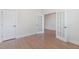 Bright office space with hardwood floors, with glass paneled doors, and white trim at 2434 Heron Watch Pl, Fuquay Varina, NC 27526