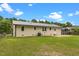 Home's backyard shows a concrete patio and exterior at 2712 Cameron Dr, Sanford, NC 27332
