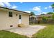 Home's backyard shows a concrete patio and exterior door at 2712 Cameron Dr, Sanford, NC 27332