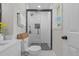 Recently renovated bathroom boasts modern shower and fixtures at 2712 Cameron Dr, Sanford, NC 27332