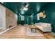 Inviting living room features stylish decor, wood floors, and a ceiling fan at 2712 Cameron Dr, Sanford, NC 27332