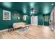 Living room showcasing a cozy sofa, unique decor, and wood flooring at 2712 Cameron Dr, Sanford, NC 27332