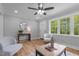 Cozy living room with ample natural light, hardwood floors, and neutral paint at 2712 Cameron Dr, Sanford, NC 27332