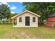 Charming outdoor shed with a door and windows at 2712 Cameron Dr, Sanford, NC 27332
