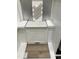 Selection of herringbone backsplash tiles, a quartz countertop, stylish cabinet and luxury vinyl flooring at 311 Chesapeake Commons St # 101, Garner, NC 27529
