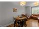 Cozy dining area with round table and hardwood floors at 400 W Rosemary St # 104, Chapel Hill, NC 27516