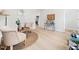 Cozy living room area with light hardwood floors and neutral decor, creating a warm, inviting space at 403 Mayodan Dr, Cary, NC 27511