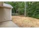 Picture of the backyard showing wooded view beyond the fence at 411 A Aversboro Rd, Garner, NC 27529