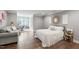 Bedroom featuring a cozy couch, desk, and stylish decor for a comfortable living space at 4237 Rowan St, Raleigh, NC 27609