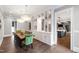 Beautiful dining area featuring hardwood floors, custom server cabinet, modern lighting and decor at 4237 Rowan St, Raleigh, NC 27609