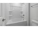 Clean and functional bathroom with a combined tub and shower, perfect for everyday convenience at 433 Providence Springs Ln, Fuquay Varina, NC 27526