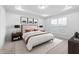 Comfortable bedroom with plush carpeting, tray ceiling, neutral tones, and stylish furnishings at 433 Providence Springs Ln, Fuquay Varina, NC 27526