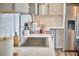 Close-up showcasing the modern stainless steel appliances and marble countertops in the kitchen at 4513 Denfield St, Durham, NC 27704