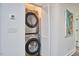 Conveniently located laundry closet with stacked washer and dryer units at 4513 Denfield St, Durham, NC 27704