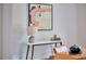Office area showcasing a modern side table with lamp, books and artwork at 4513 Denfield St, Durham, NC 27704