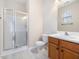 Bathroom with a glass-enclosed shower, single vanity and tiled floors at 522 Auburn Square Dr, Durham, NC 27713