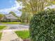 View of street with sidewalks and landscaping at 522 Auburn Square Dr, Durham, NC 27713