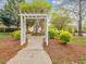 Community area showcasing sidewalks, landscaping, and greenery at 522 Auburn Square Dr, Durham, NC 27713