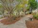 View of sidewalks, landscaping, and benches in a community space at 522 Auburn Square Dr, Durham, NC 27713