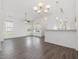 Spacious living room with lots of natural light, hardwood flooring, and ceiling fan at 522 Auburn Square Dr, Durham, NC 27713