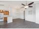Bright living room featuring hardwood floors, an open layout, and modern ceiling fan at 522 Auburn Square Dr, Durham, NC 27713